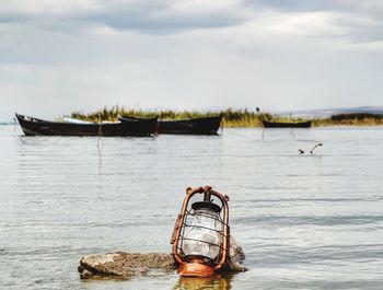 Ship in sea against sky