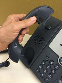 Close-up of man using mobile phone