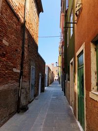 Narrow alley along buildings