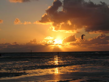 Scenic view of sea at sunset