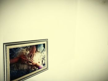 Portrait of woman against sky seen through glass wall