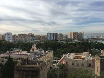 High angle view of buildings in city against sky