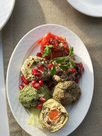 High angle view of fruits in plate on table