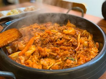 Close-up of meat in cooking pan