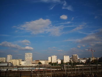 Modern buildings in city against sky