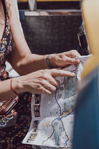 Midsection of woman working