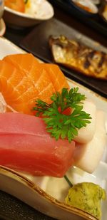 Close-up of fish served on table