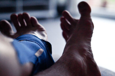 Low section of man at home