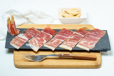 High angle view of fish in plate on table