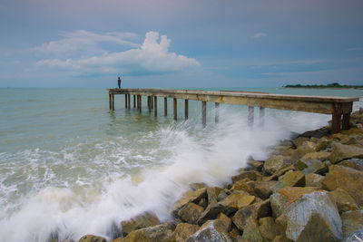 Rear view of man on pier