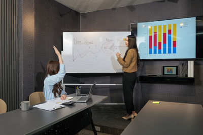 Business colleagues working at office