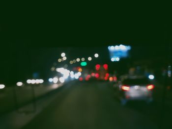 Defocused lights on road at night