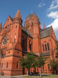 Low angle view of holy cross church against sky