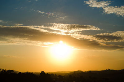 Scenic view of silhouette landscape against sky during sunset