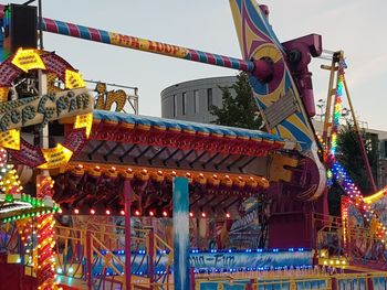 Low angle view of illuminated ferris wheel