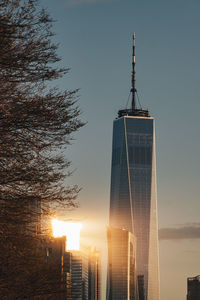 Low angle view of buildings against sky during sunset