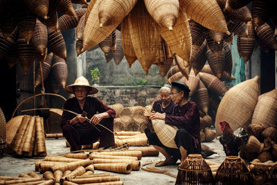Group of people at market stall
