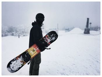 Man standing on snow