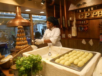 Man preparing food in restaurant