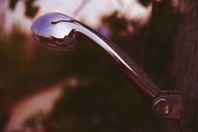 Close-up of water drops on metal