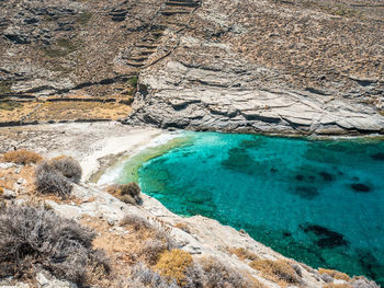 High angle view of rocks in sea