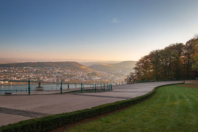 Scenic view of city against clear sky
