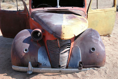 Close-up of abandoned vintage car