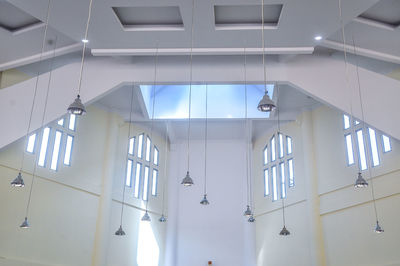 Low angle view of illuminated ceiling