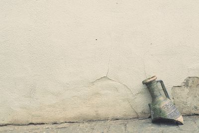 High angle view of wine bottle against wall