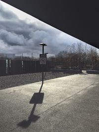 View of road against cloudy sky