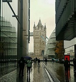 People walking in front of buildings