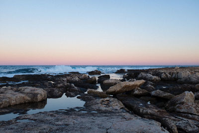 Scenic view of sea against clear sky