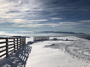 Scenic view of sea against sky during winter