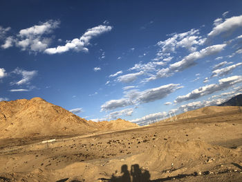 Scenic view of desert against sky