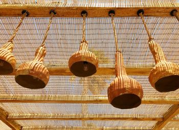 Low angle view of lanterns hanging on ceiling