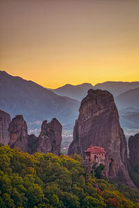 Scenic view of mountain against sky during sunset