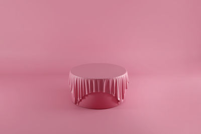 Close-up of electric light on pink table