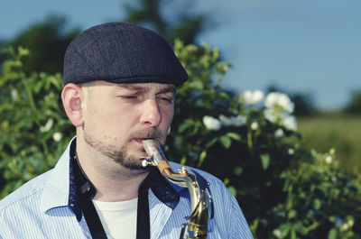 Close-up of man playing saxophone