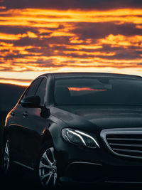 Car against sky during sunset