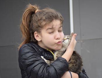 Side view of a boy smoking cigarette