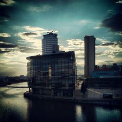 Buildings in city against sky