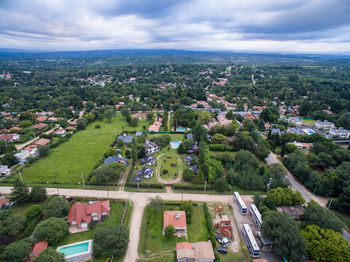 High angle view of houses and buildings in city