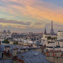 High angle view of buildings against sky during sunset