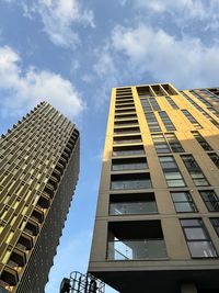 Low angle view of skyscraper against sky