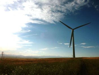 Wind turbines on field