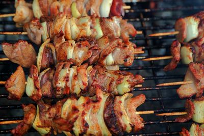 Close-up of meat on barbecue grill