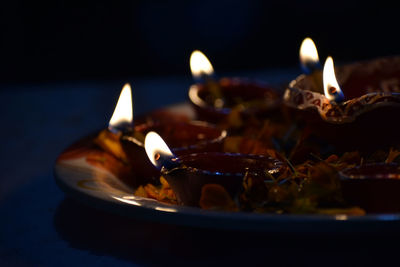 Close-up of burning candle