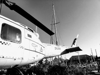 Close-up of airplane against sky