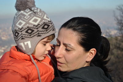 Close-up of mother and son