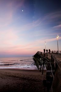 Scenic view of sea against sky at sunset